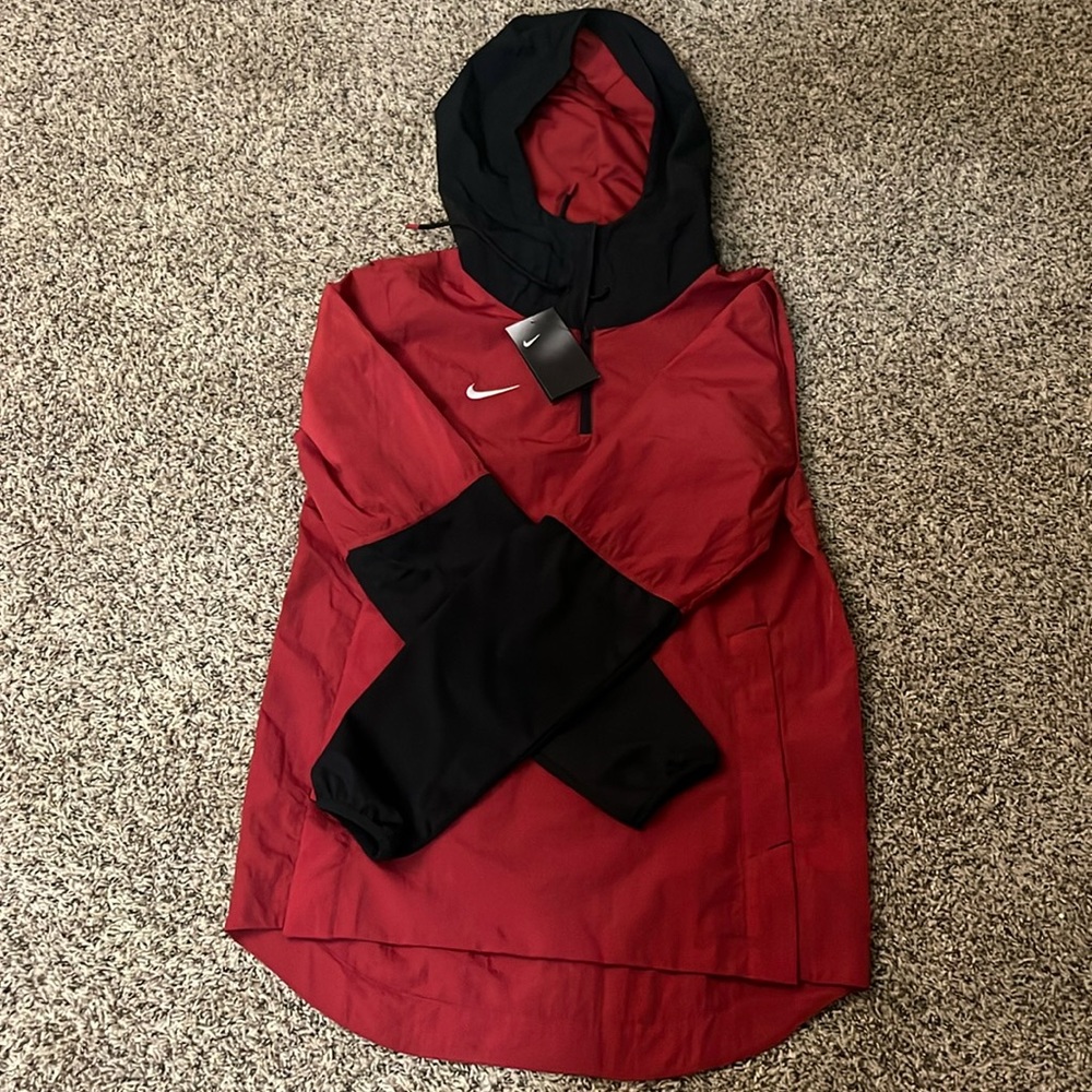 Nike windbreaker fits like medium really oversized